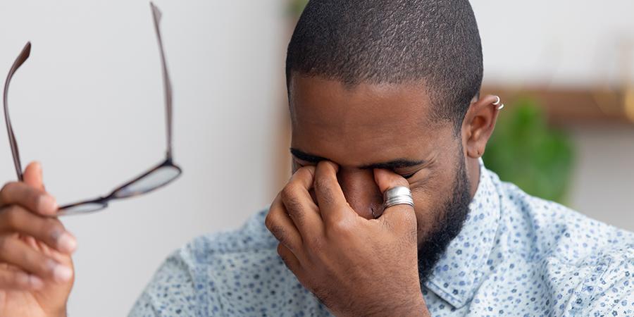 User Experiencing Relief from Digital Eye Strain with Red Light Therapy