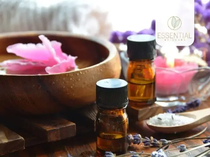 A serene woman engaging in a holistic skincare ritual, combining light therapy and thoughtful serum application for skin and mood benefits.