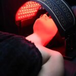 Red light therapy session calming facial redness and strengthening sensitive skin barrier